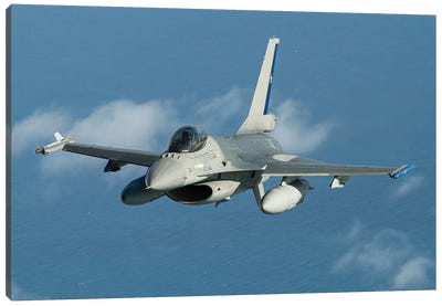 A Chilean Air Force F-16 Fighting Falcon Flying Over The Atlantic Ocean Canvas Art Print - Jordy Blue
