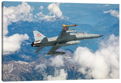 A Swiss Air Force F-5F Tiger II Flying Over The Outskirts Of The Swiss Alps Canvas Art Print - Military Aircraft Art