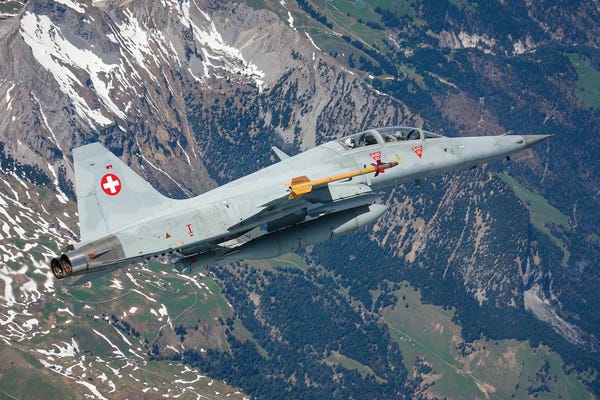 Military Aircraft: A Swiss Air Force F-5F Tiger II Flying Over The Swiss Alps I by Dirk Jan de Ridder