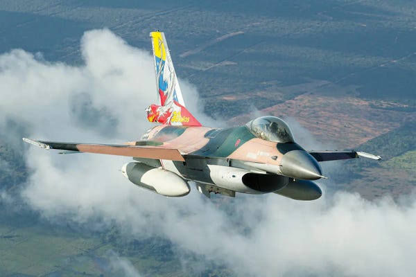 Military Aircraft: A Venezuelan Air Force F-16 Fighting Falcon Flying Over Brazil by Dirk Jan de Ridder