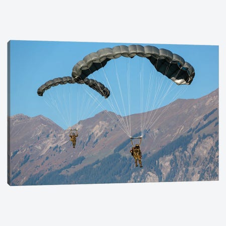 Swiss Army Paratroopers Descending Through The Sky, Meiringen, Switzerland Canvas Print #TRK4137} by Timm Ziegenthaler Canvas Art Print