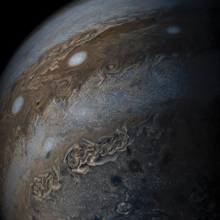An Enhanced-Color Image Of Jupiter's Bands Of Light And Dark Clouds