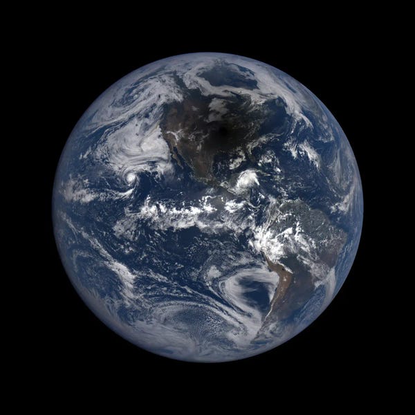 Stocktrek Images: Natural Color Image Of The Moon's Shadow Crossing Over North America by Stocktrek Images
