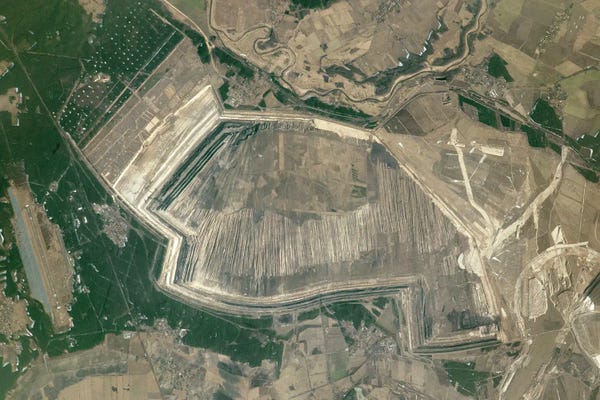Stocktrek Images: View From Space Of A Strip Mine In Germany, Located Along The Polish Border At The Neisse River by Stocktrek Images