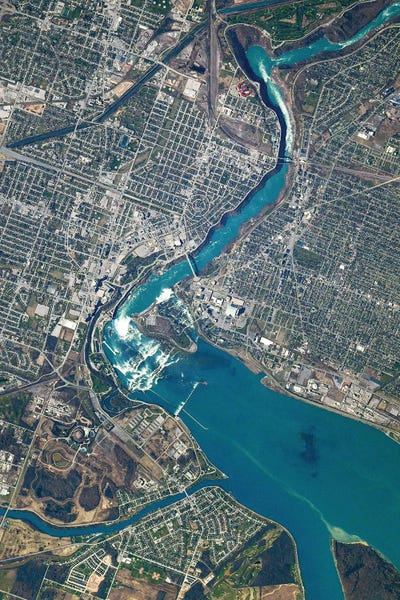 Astronomy & Space Collection: View From Space Showing The Water Cascading Through Niagara Gorge And Niagara Falls by Stocktrek Images