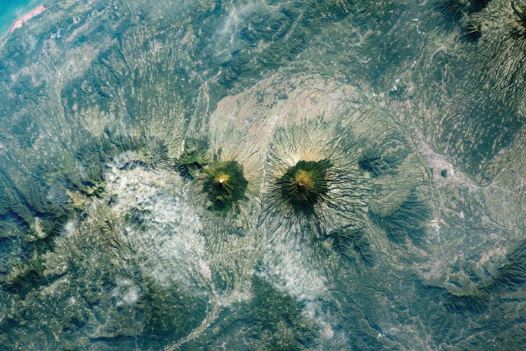 View From Space Of Mount Sundoro And Mount Sumbing On The Island Of Java, Indonesia by Stocktrek Images wall art
