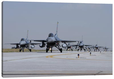 A Squadron Of Turkish Air Force F-16C And F-16D Aircraft Taxiing On The Runway Canvas Art Print