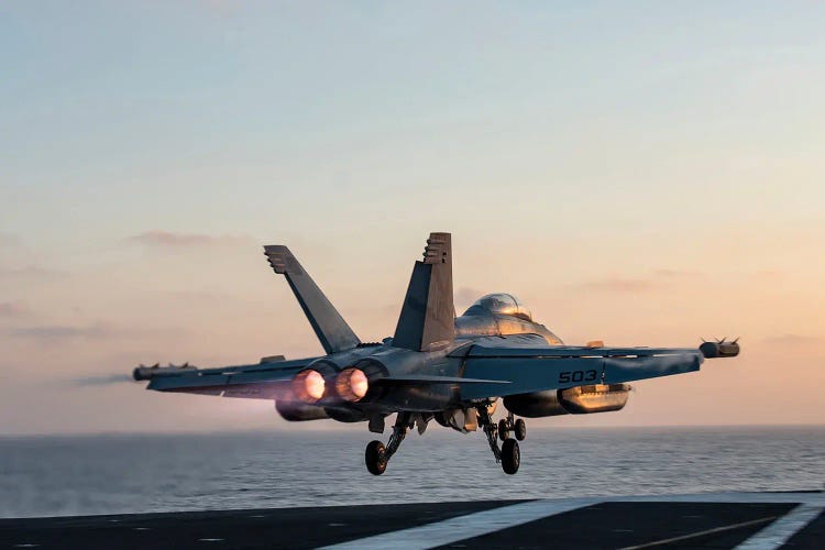An Ea-18G Growler Launches From The Aircraft Carrier USS George H.W. Bush
