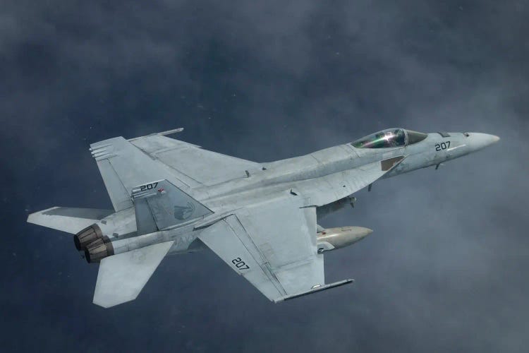 An F/A-18E Super Hornet Flies Over The Philippine Sea by Stocktrek Images wall art