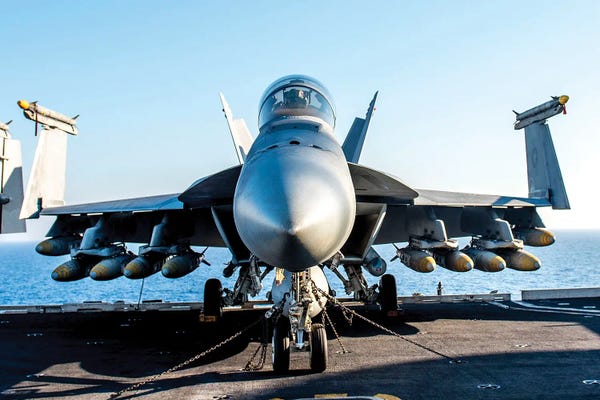 An F/A-18F Super Hornet Is Fully Loaded With 10 Gbu-32 1,000 Pound Bombs