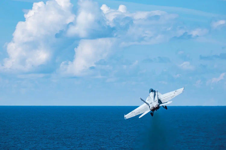 An F/A-18F Super Hornet Launches From The Aircraft Carrier USS George HW Bush