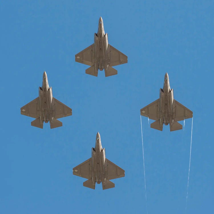 Four F-35C Lightning Ii Joint Strike Fighters Fly In Formation