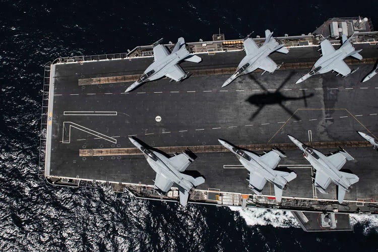 The Aircraft Carrier USS Theodore Roosevelt Transits The Pacific Ocean