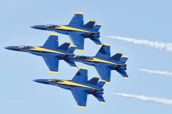 Military Aircraft: The Blue Angels, Perform The Diamond Formation Maneuver by Stocktrek Images