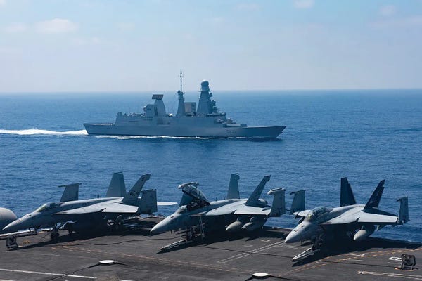 Warships: The French Navy Frigate Fs Chevalier Paul Underway Alongside USS George H.W. Bush by Stocktrek Images