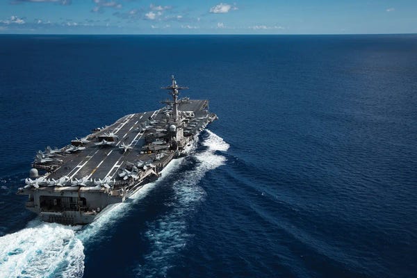 Warships: The Nimitz-Class Aircraft Carrier USS Carl Vinson Transits The Philippine Sea by Stocktrek Images