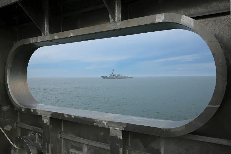 USS Forest Sherman As It Passes Expeditionary Fast Transport Ship USNS Carson City