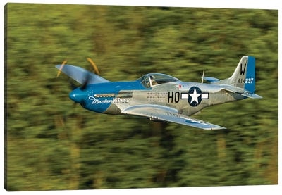A P-51 Mustang Flies Along The Mississippi At Dubuque, Iowa Canvas Art Print