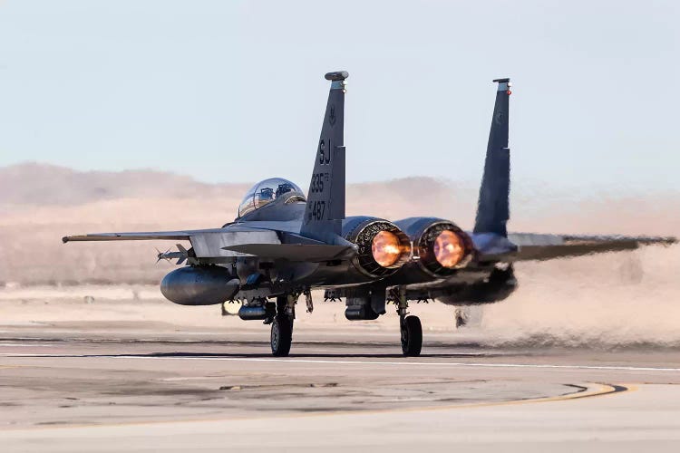 A US Air Force F-15E Strike Eagle Takes Off In Full Afterburner