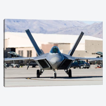 A US Air Force F-22A Raptor Taxiing At Nellis Air Force Base, Nevada Canvas Print #TRK447} by Rob Edgcumbe Canvas Wall Art