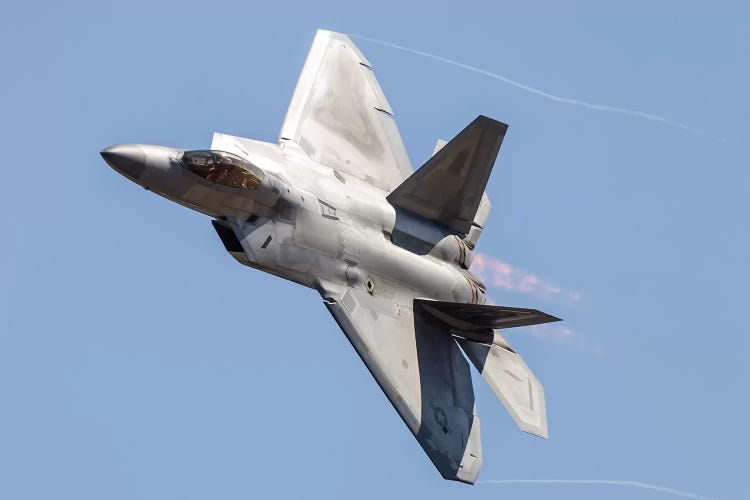 An F-22A Raptor Of The US Air Force Turns At High Speed I