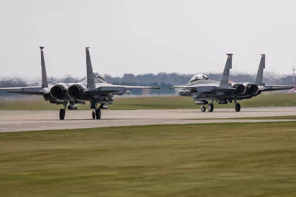 Air Force: F-15E Strike Eagles Of The US Air Force Line Up For Takeoff by Rob Edgcumbe