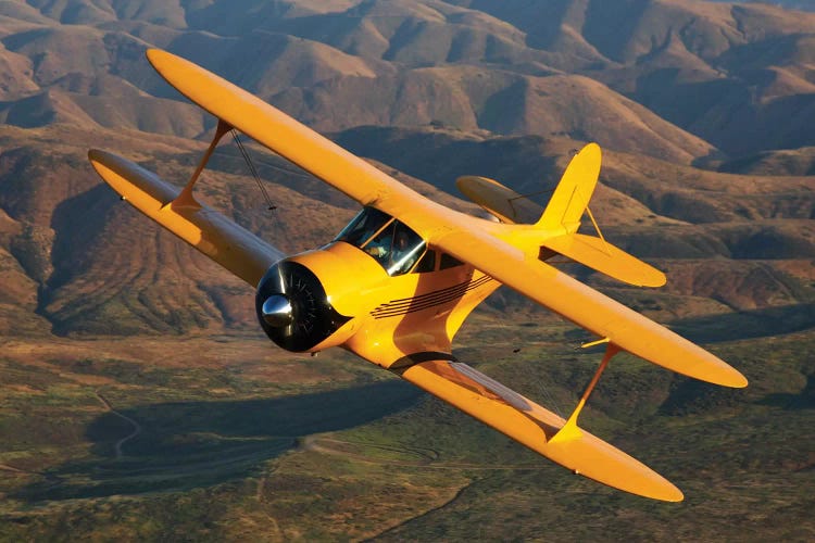 A Beechcraft Model B17R Staggerwing In Flight