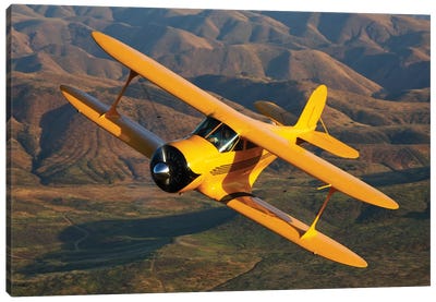 A Beechcraft Model B17R Staggerwing In Flight Canvas Art Print - Airplane Art