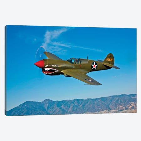 A Curtiss P-40E Warhawk In Flight Near Chino, California II Canvas Print #TRK468} by Scott Germain Canvas Print