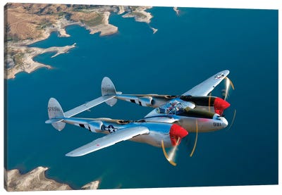 A Lockheed P-38 Lightning Fighter Aircraft In Flight II Canvas Art Print - Veterans Day