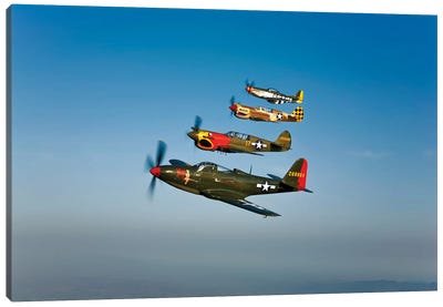 A P-36 Kingcobra, Two Curtiss P-40N Warhawks, And A P-51D Mustang In Flight Canvas Art Print