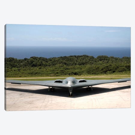 A B-2 Spirit Stealth Bomber Waits On The Flightline Canvas Print #TRK519} by Stocktrek Images Art Print