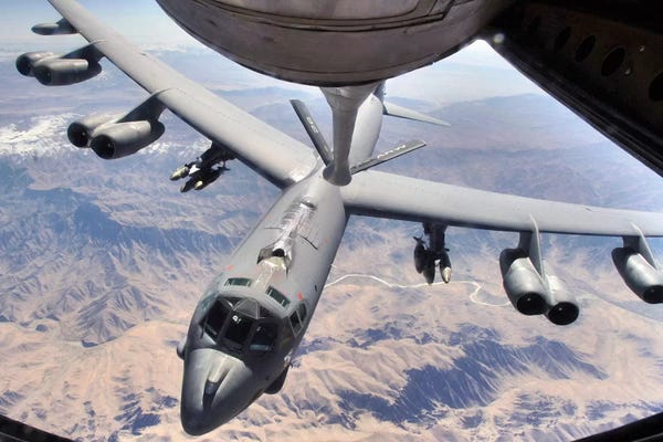 Military Aircraft: A B-52 Stratofortress Receives Fuel From A KC-135 Stratotanker Over Afghanistan by Stocktrek Images