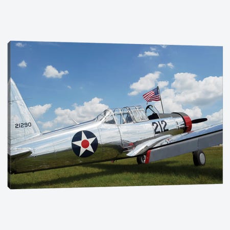 A BT-13 Valiant Trainer Aircraft With American Flag Canvas Print #TRK530} by Stocktrek Images Art Print