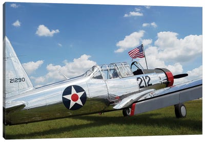 A BT-13 Valiant Trainer Aircraft With American Flag Canvas Art Print - Veterans Day