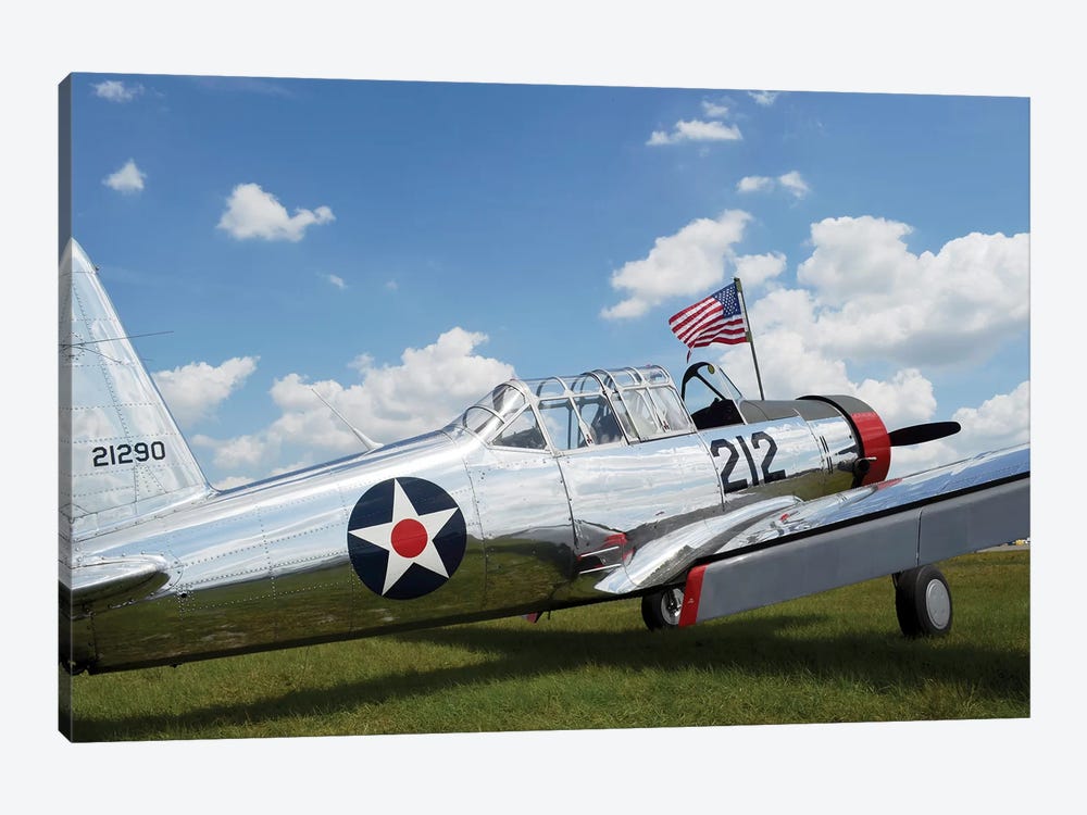A BT-13 Valiant Trainer Aircraft With American Flag by Stocktrek Images 1-piece Canvas Artwork