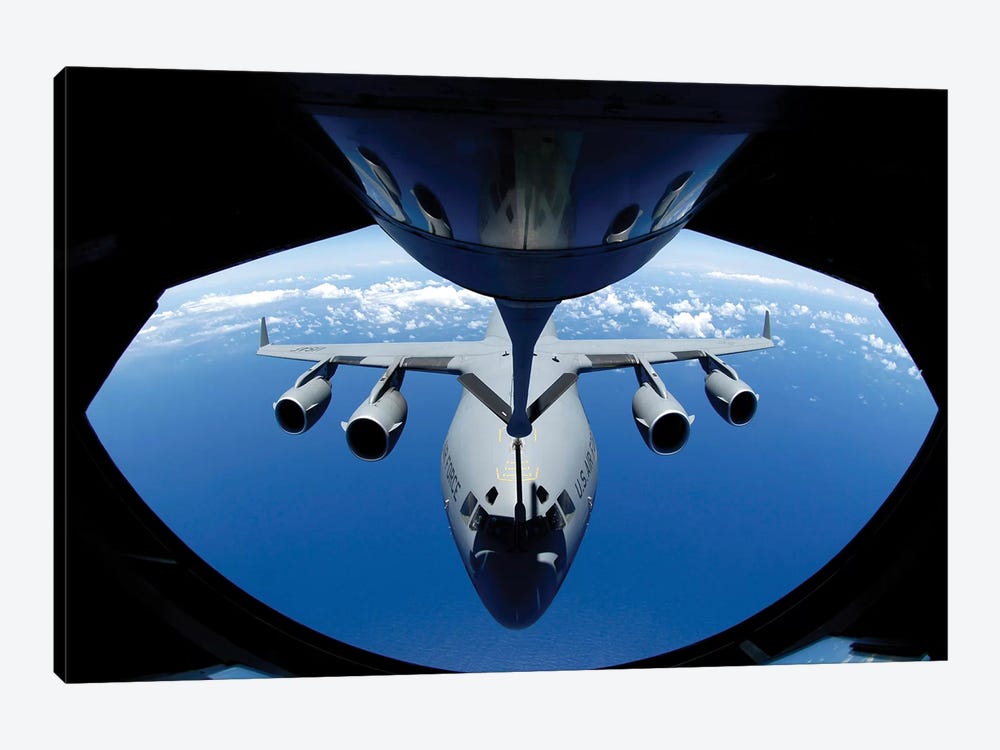 A C-17 Globemaster III Receives Fuel From A KC-135 Stratotanker by Stocktrek Images 1-piece Canvas Print