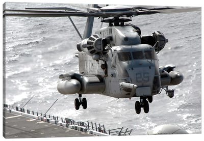 A CH-53E Super Stallion Helicopter Takes Off From USS Makin Island Canvas Art Print