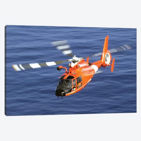 A Coast Guard HH-65A Dolphin Rescue Helicopter In Flight Canvas Print #TRK543} by Stocktrek Images Canvas Artwork