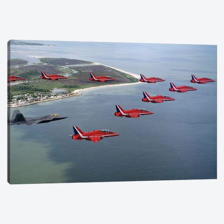 A F-22 Raptor Flies In Formation With The Royal Air Force Aerobatic Team, The Red Arrows Canvas Print #TRK552} by Stocktrek Images Canvas Print