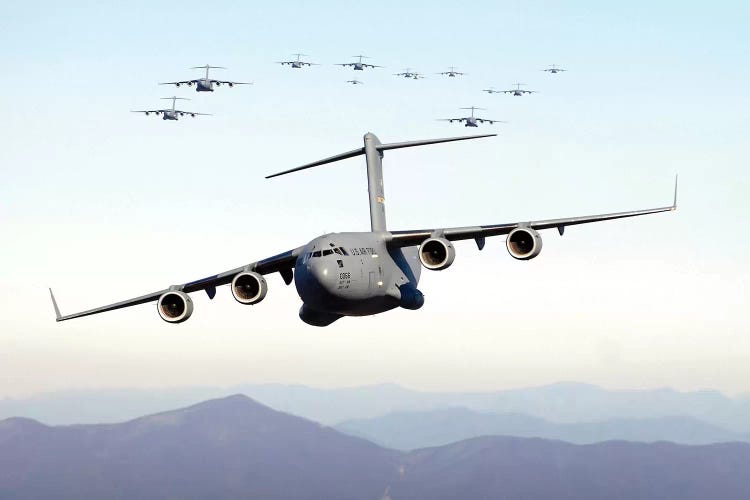 A Formation Of 17 C-17 Globemaster IIIs Fly Over The Blue Ridge Mountains