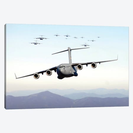 A Formation Of 17 C-17 Globemaster IIIs Fly Over The Blue Ridge Mountains Canvas Print #TRK555} by Stocktrek Images Canvas Wall Art