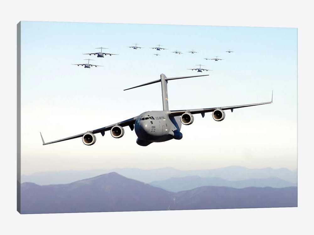 A Formation Of 17 C-17 Globemaster IIIs Fly Over The Blue Ridge Mountains by Stocktrek Images 1-piece Canvas Print