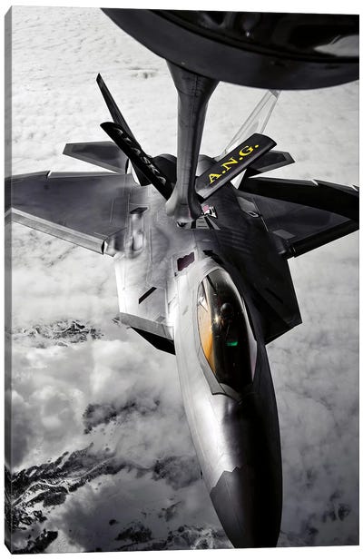 A KC-135 Stratotanker Refuels A F-22 Raptor Canvas Art Print - Airplane Art