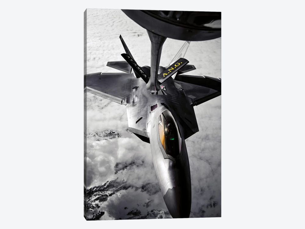 A KC-135 Stratotanker Refuels A F-22 Raptor by Stocktrek Images 1-piece Art Print