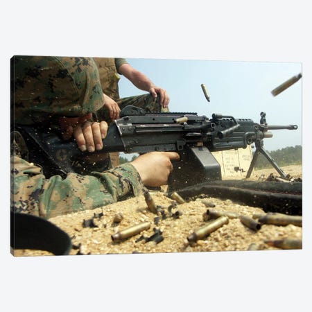 A Marine Engages Targets With An M-249 Squad Automatic Weapon Canvas Print #TRK566} by Stocktrek Images Art Print