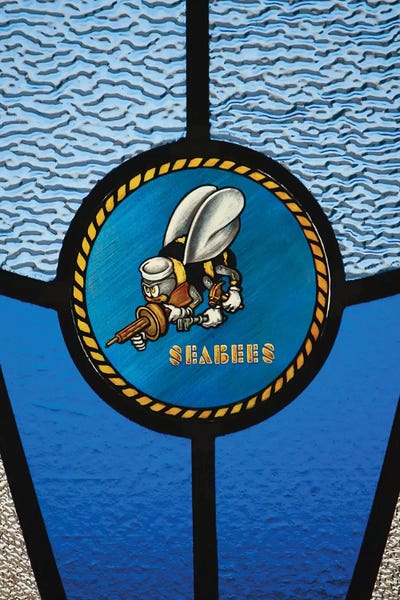 A Single Seabee Logo Built Into A Stained-Glass Window