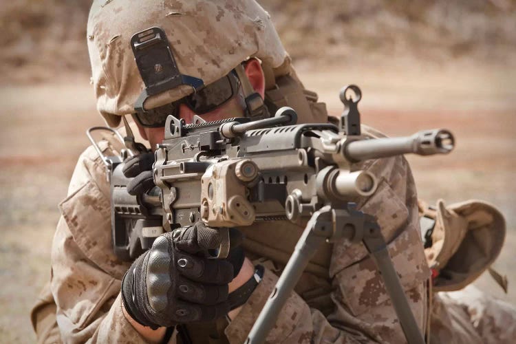 A Squad Automatic Weapon Gunner Provides Security