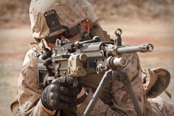 Marines: A Squad Automatic Weapon Gunner Provides Security by Stocktrek Images