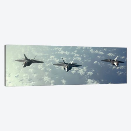 A Three-Ship Formation Of F-22 Raptors Fly Over The Pacific Ocean Canvas Print #TRK610} by Stocktrek Images Canvas Artwork
